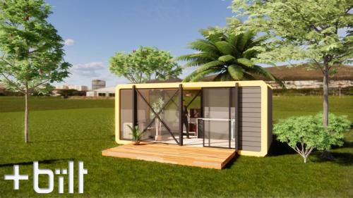 Modular office/sleeping space with kitchen and bathroom. Medium Distance View.